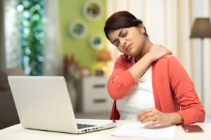 A person suffering from neck pain, feeling pain due to wrong sleeping posture."